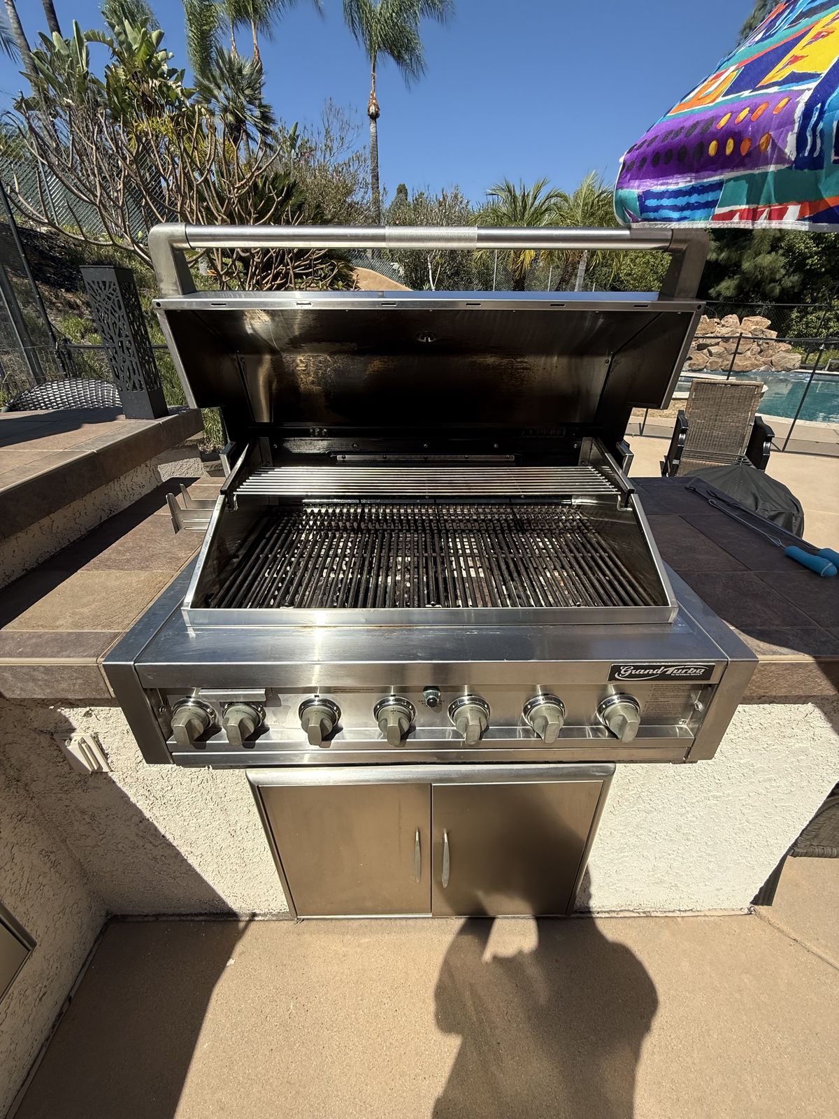 Freshly cleaned built-in BBQ grill, San Diego backyard
